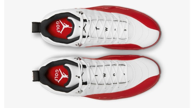 View of white and red Air Jordan shoes.