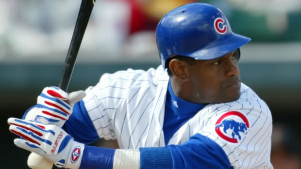 Chicago Cubs outfielder Sammy Sosa prepares to swing.