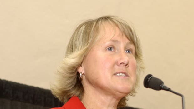Cheryl Bailey speaking during an event while with the Wisconsin Athletic Department.