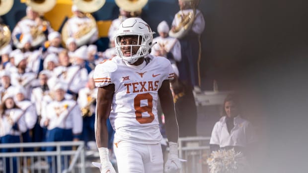 Texas wide receiver Xavier Worthy (8) smiles after scoring a touchdown during the game against West Virginia on Saturday, Nov. 20, 2021. Mlc Ut Wv Football 1106