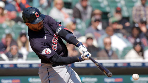 Apr 19, 2023; Detroit, Michigan, USA; Cleveland Guardians second baseman Gabriel Arias (13) hits a single in the ninth inning against the Detroit Tigers at Comerica Park. Mandatory Credit: Rick Osentoski-USA TODAY Sports