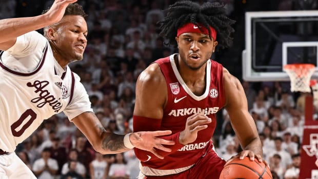 Arkansas guard Ricky Council drives to the basket against Texas A&M in College Station.