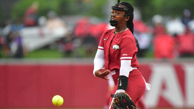 Arkansas pitcher Chenise Delce takes aim at the Oregon Ducks following a rain delay of roughly two hours at the Fayetteville regional. Delce went on to strike out nine batters while claiming the win.