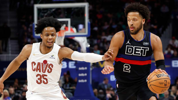 Mar 1, 2024; Detroit, Michigan, USA; Detroit Pistons guard Cade Cunningham (2) dribbles defended by Cleveland Cavaliers forward Isaac Okoro (35) in the first half at Little Caesars Arena. Mandatory Credit: Rick Osentoski-USA TODAY Sports
