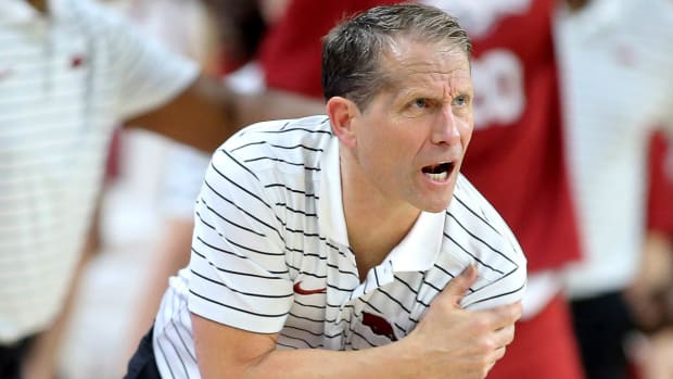 Arkansas coach Eric Musselman tries to get his team back in focus during the team's loss to Mississippi State in Bud Walton Arena.