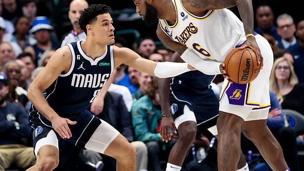 Josh Green guards LeBron James 1-on-1 in the Dallas Mavericks' game against the Los Angeles Lakers on Feb. 26.