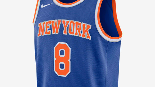 Blue and orange New York Knicks jersey.
