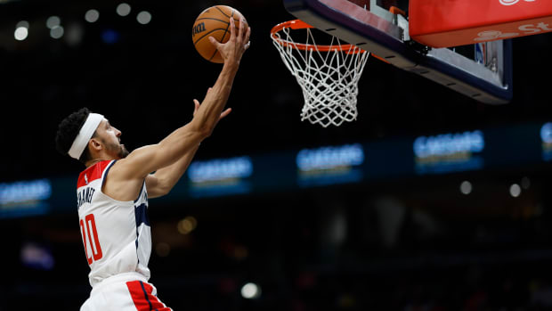 Washington Wizards guard Landry Shamet (20) shoots the ball against the Oklahoma City Thunder in the third quarter at Capital One Arena.