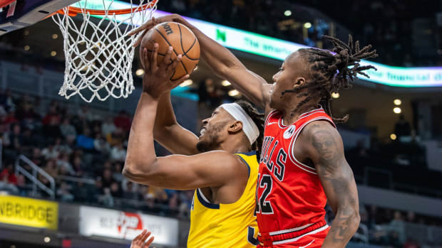 Indiana Pacers center Myles Turner (33) shoots the ball while Chicago Bulls guard Ayo Dosunmu (12) defends in the second half at Gainbridge Fieldhouse.