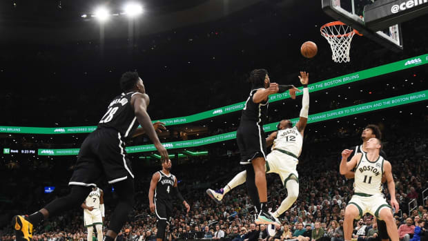 Brooklyn Nets forward Trendon Watford (9) blocks the shot of Boston Celtics forward Oshae Brissett (12)