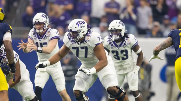 TCU Horned Frogs offensive lineman Brandon Coleman (77) against the Michigan Wolverines during the 2022 Fiesta Bowl at State Farm Stadium.