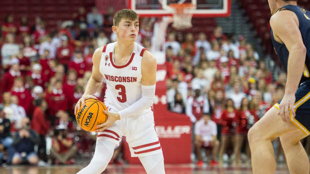 Freshman guard Connor Essegian surveying the defense on offense for Wisconsin.