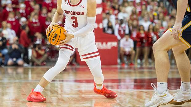 Freshman guard Connor Essegian surveying the defense on offense for Wisconsin.