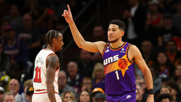 November 30, 2022; Phoenix Suns guard Devin Booker celebrates during the game against the Chicago Bulls at Footprint Center