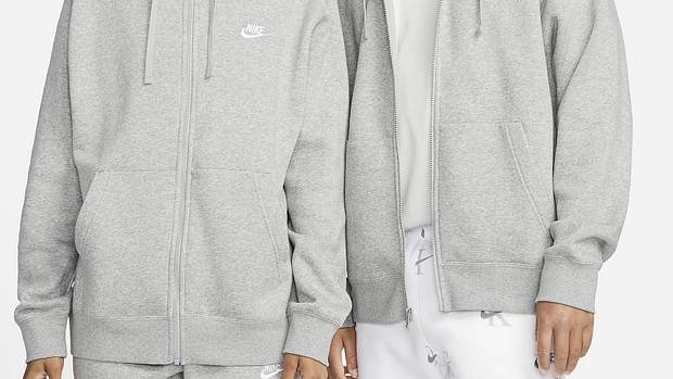 Male and female model wear grey Nike fleece jackets.