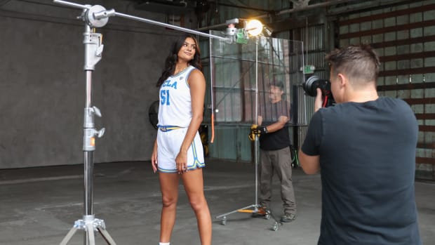 UCLA Women's basketball player Lauren Betts poses for a photoshoot.