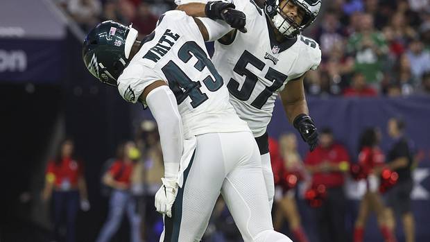 Kyzir White and T.J. Edwards