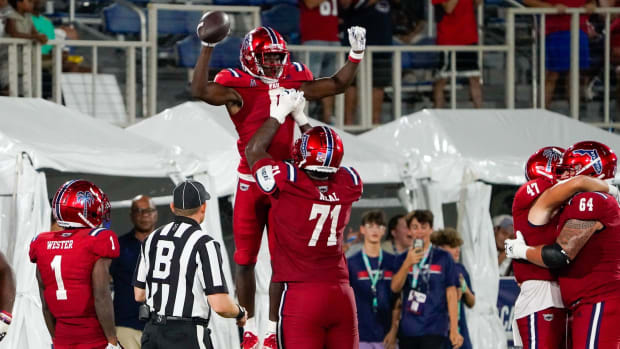 Florida Atlantic wide receiver Tony Johnson (0) celebrates a touchdown pass during a 42-20 victory over Monmouth at FAU Stadium on Saturday, September 2, 2023, in Boca Raton, FL.