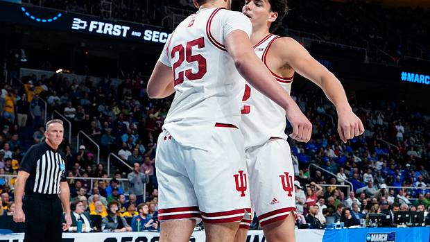 Race Thompson (25) reacts with guard Trey Galloway (32) in the first half against the Kent State Golden Flashes at MVP Arena.