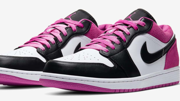 View of black, white, and pink Jordan shoes.