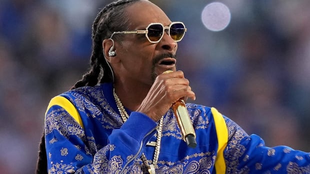 Snoop Dogg performs during halftime of Super Bowl 56 between the Los Angeles Rams and the Cincinnati Bengals, Sunday, Feb. 13 at SoFi Stadium in Inglewood, Calif. Hog fan Guy Douglas Dailey suggested Snoop Dogg make his way up from Southern California to San Francisco to adopt the Razorbacks as his own for the rest of the NCAA Men's Tournament.