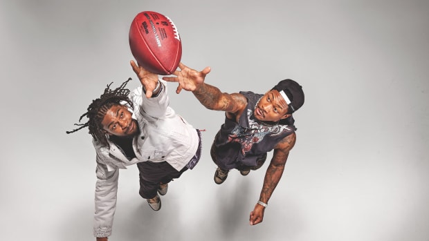 Stefon and Trevon Diggs try to catch a football