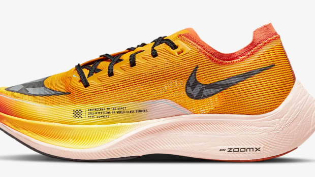 Orange Nike running shoe.