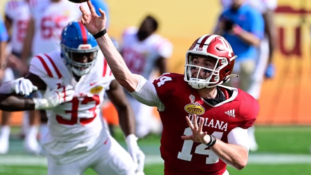 Indiana Hoosiers quarterback Jack Tuttle (14) looks to pass the ball during the first half against the Mississippi Rebels during the Outback Bowl at Raymond James Stadium.