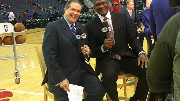 Bob Rathbun poses for a picture with Dominique Wilkins.