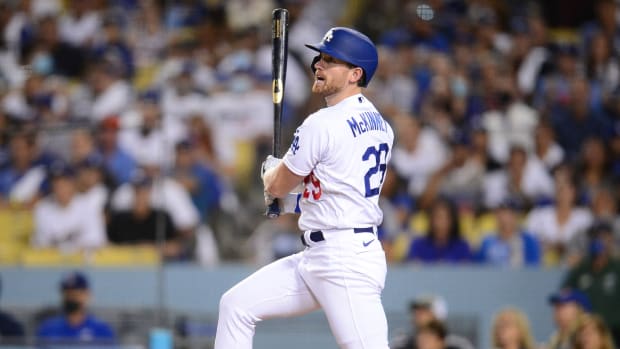 Aug 19, 2021; Los Angeles, California, USA; Los Angeles Dodgers pinch hitter Billy McKinney (29) hits an RBI double against the New York Mets during the fifth inning at Dodger Stadium. Mandatory Credit: Gary A. Vasquez-USA TODAY Sports