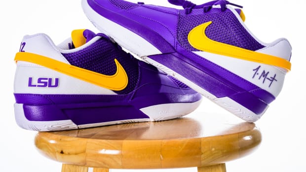 Side view of Ja Morant's purple and gold Nike sneakers.