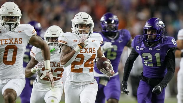 Texas Longhorns running back Jonathon Brooks (24) runs for the first down against TCU Horned Frogs in the first quarter of an NCAA college football game, Saturday, November. 11, 2023, at Amon G. Carter Stadium