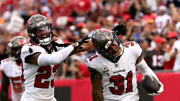 Tampa Bay Buccaneers defensive back Antoine Winfield Jr. (31) celebrates with defensive back Ryan Neal (23) after an interception in the second half against the Tennessee Titans Raymond James Stadium.