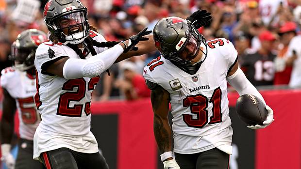 Tampa Bay Buccaneers defensive back Antoine Winfield Jr. (31) celebrates with defensive back Ryan Neal (23) after an interception in the second half against the Tennessee Titans Raymond James Stadium.