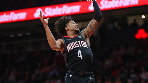 Rockets guard Jalen Green (4) grabs a rebound against the Atlanta Hawks in the first quarter at State Farm Arena.