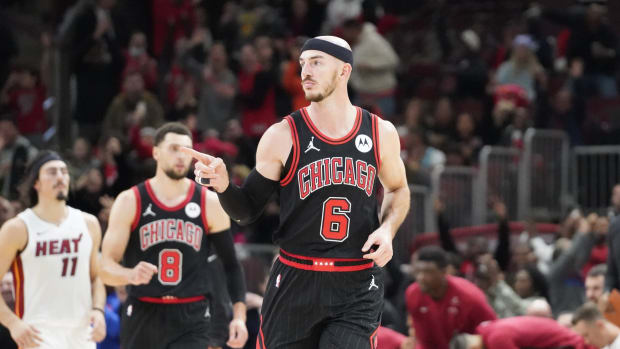 November 18, 2023; Chicago Bulls guard Alex Caruso after making a clutch three-pointer against Miami Heat at United Center