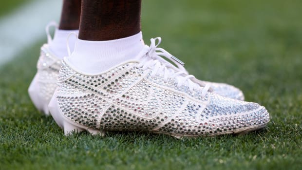 View of crystal-covered Nike cleats.