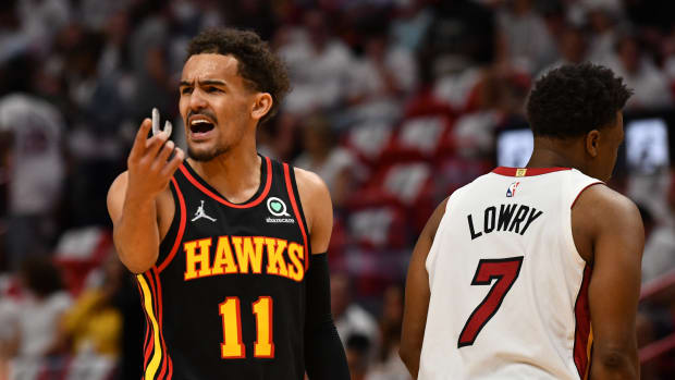 Apr 17, 2022; Miami, Florida, USA; Atlanta Hawks guard Trae Young (11) has a few words for the officials during the first half of game one of the first round for the 2022 NBA playoffs against the Miami Heat at FTX Arena.