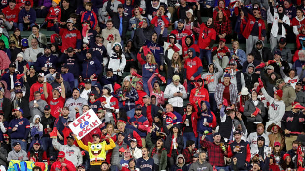 Cleveland Guardians fans, including one dressed as SpongeBob cheer for Cleveland Guardians right fielder Oscar Gonzalez (39) during the second inning of Game 4 of an American League Division baseball series at Progressive Field, Sunday, Oct. 16, 2022, in Cleveland, Ohio. Alds Game 4 7