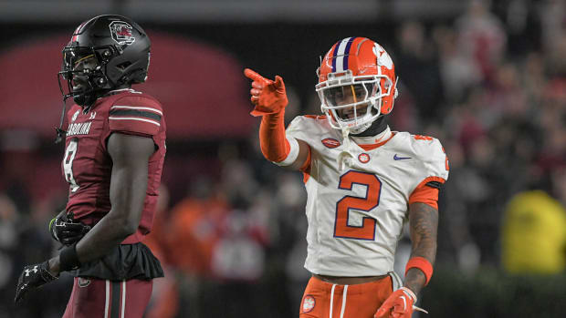 Clemson Tigers cornerback Nate Wiggins (2) smiles after breaking up a pass to South Carolina wide receiver Nyck Harbor (8) during the fourth quarter at Williams-Brice Stadium. Clemson won 16-7. Mandatory Credit: Ken Ruinard-USA TODAY Sports