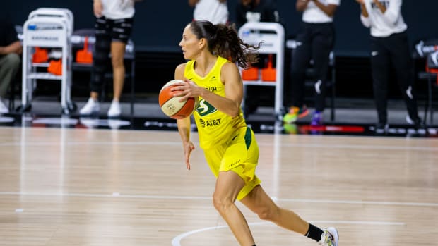 Seattle Storm guard Sue Bird dribbles the basketball.