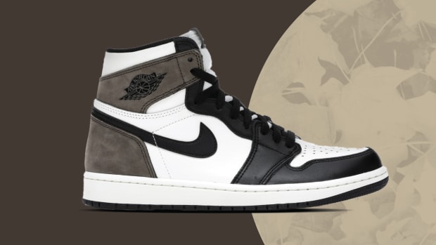 Side view of brown, white, and black Air Jordan sneaker.