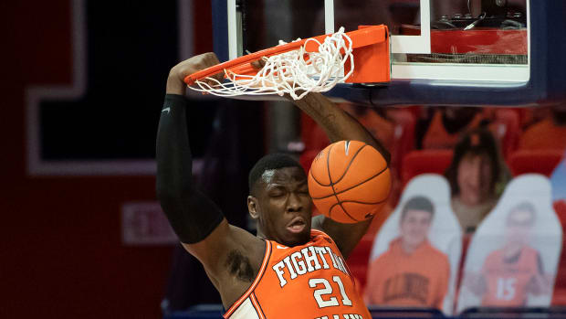 Illinois Fighting Illini center Kofi Cockburn (21) dunks the ball during the first half against the Penn State Nittany Lions at the State Farm Center.