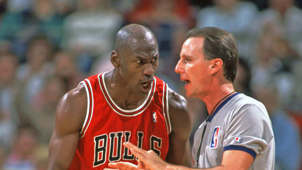 Chicago Bulls guard Michael Jordan reacts to a call with an official against the Orlando Magic