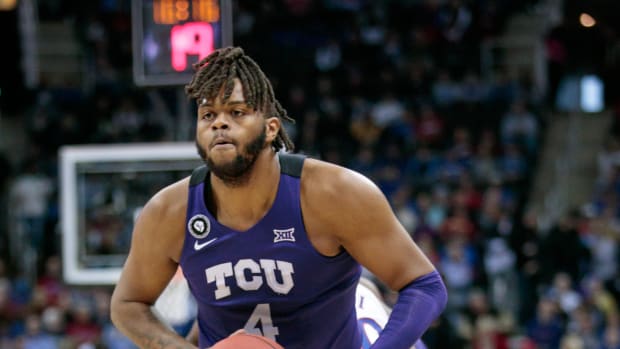 Mar 11, 2022; Kansas City, MO, USA; TCU Horned Frogs center Eddie Lampkin (4) looks to pass during the first half against the Kansas Jayhawks at T-Mobile Center. Mandatory Credit: William Purnell-USA TODAY Sports