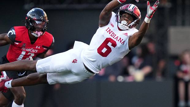 Indiana Hoosiers wide receiver Cam Camper (6) extends to catch a pass in the third quarter of a college football game against the Cincinnati Bearcats, Saturday, Sept. 24, 2022, at Nippert Stadium in Cincinnati.
