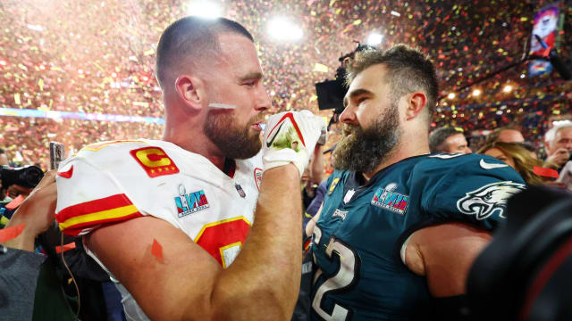 Brothers Travis (left) and Jason Kelce meet after Travis' Cheifs beat Jason's Eagles, 38-35, in Super Bowl LVII
