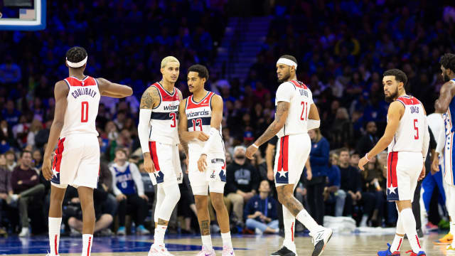 Washington Wizards Kyle Kuzma (33) and Bilal Coulibaly (0) and Jordan Poole (13) and Daniel Gafford (21) and Tyus Jones (5) during the third quarter against the Philadelphia 76ers at Wells Fargo Center. 