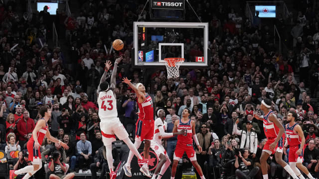 Toronto Raptors forward Pascal Siakam (43) shoots the ball at the basket as Washington Wizards forward Kyle Kuzma (33) goes for the block during the fourth quarter at Scotiabank Arena.