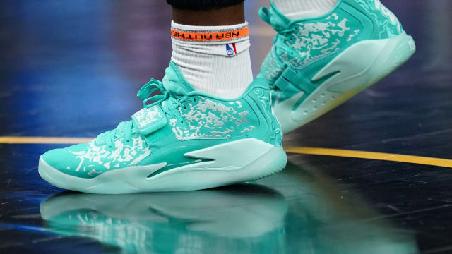 New Orleans Pelicans forward Zion Williamson's teal Jordan Brand sneakers.